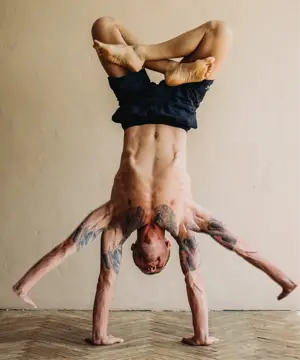 A Man Doing A Handstand On A Wooden Floor Collage Art Template