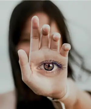 A Woman Holding Her Hand Up To Her Eye Collage Art Template