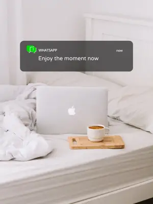 A Laptop Computer Sitting On Top Of A Bed Notifications Template
