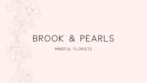 A Pink Background With Flowers And The Words Brook & Pearls Business Card Template