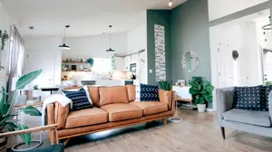 A Living Room Filled With Furniture And A Wooden Floor Zoom Backgrounds Template