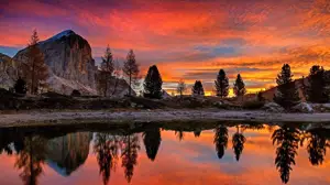 A Beautiful Sunset Over A Mountain With A Lake In The Foreground Zoom Backgrounds Template