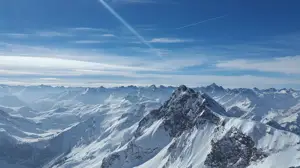 A View Of A Mountain Range From A Plane Zoom Backgrounds Template
